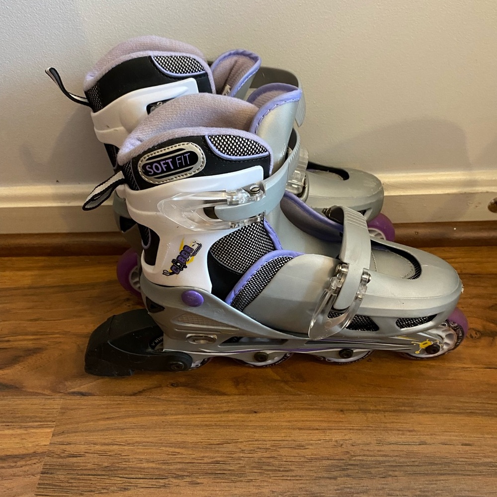 Gray and Lavender Rollerblades